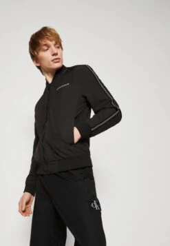 Antony Morato REGULAR FIT IN TECHNO FABRIC TOUCH WITH TRANSFER RUBB - Leichte Jacke - Black -Herrenbekleidung 120891d082cc4442ab416ab70b9a8e91