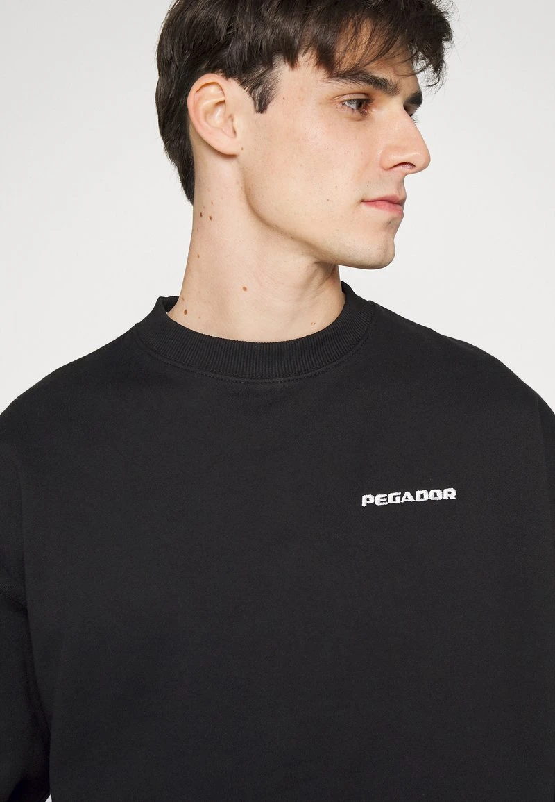 Pegador LOGO UNISEX - Sweatshirt - Black 6 Pegador LOGO UNISEX - Sweatshirt - Black – Bild 4